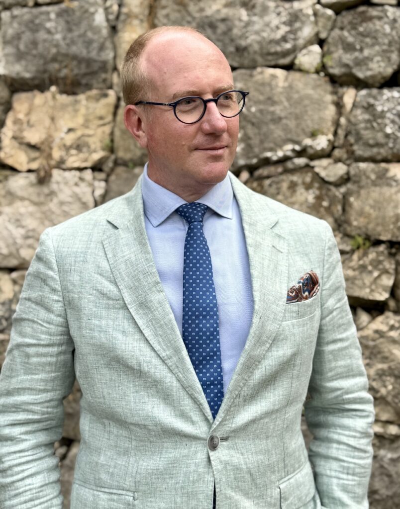 Professional portrait of Ross Osborn.